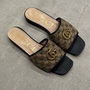 Gucci Brown and Black Mules with Gold Emblem